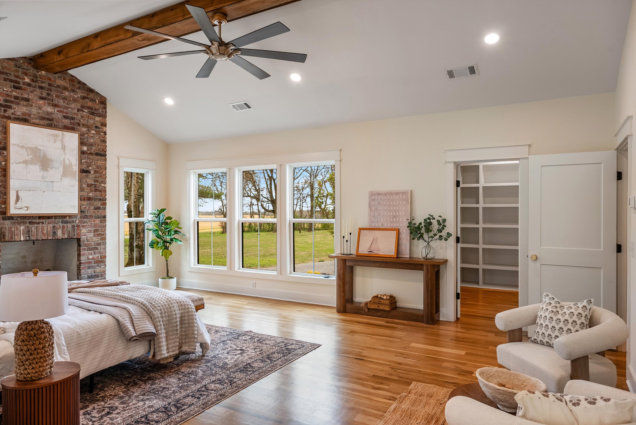 1629 Cairo Road Gallatin, TN 37066 - Photo 28 of 51 a spacious bedroom with a bed and wooden floor