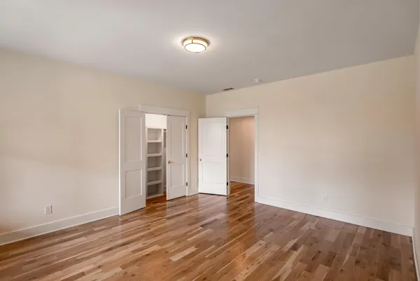 a view of a hallway with staircase