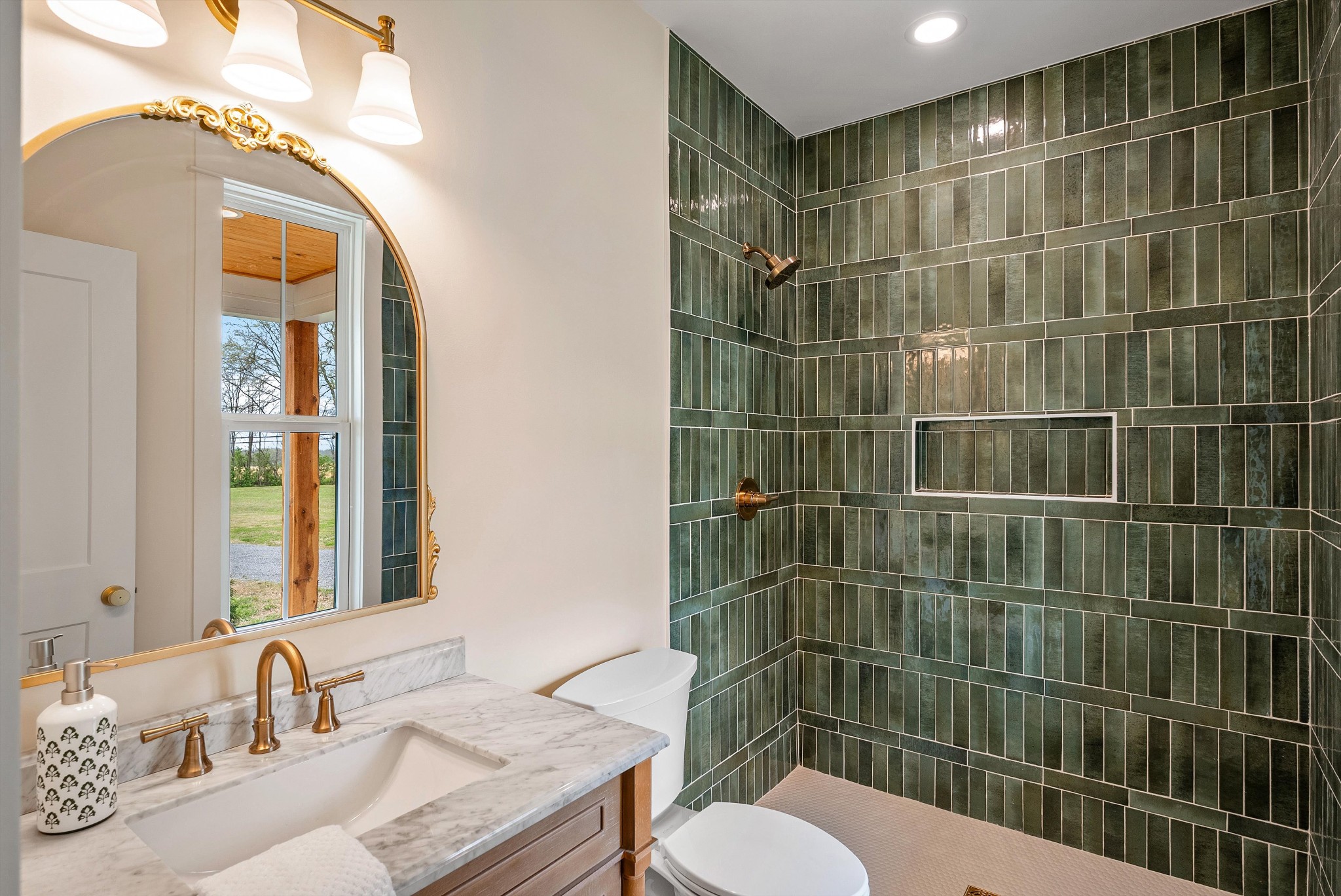 1629 Cairo Road Gallatin, TN 37066 - Photo 37 of 51 a bathroom with a sink a toilet and shower