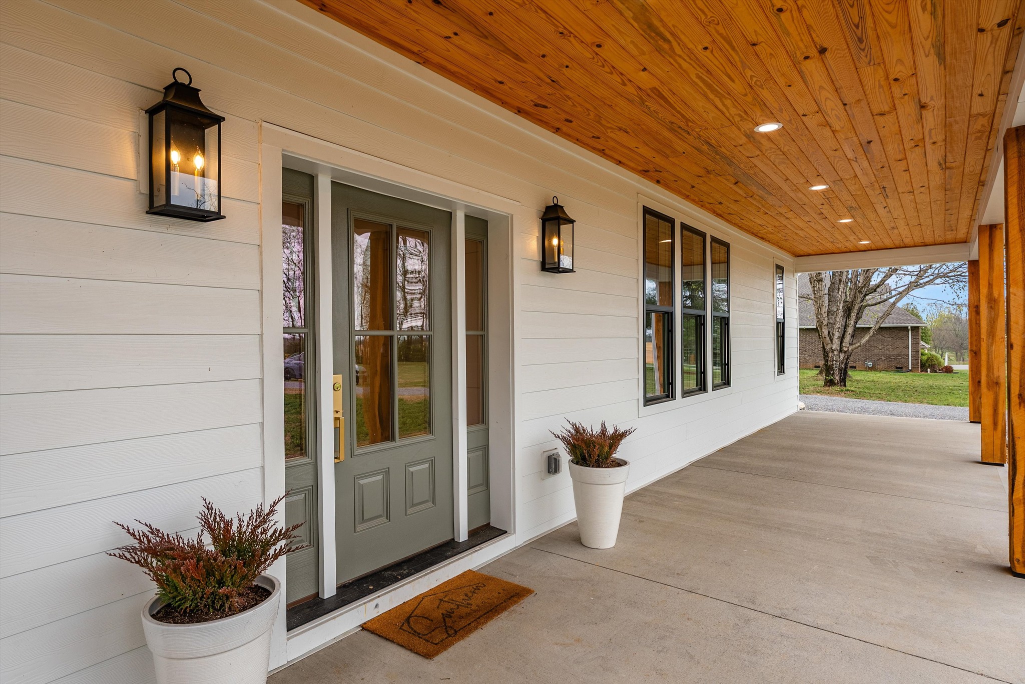 1629 Cairo Road Gallatin, TN 37066 - Photo 4 of 51 a view of a door and chair in front of a house