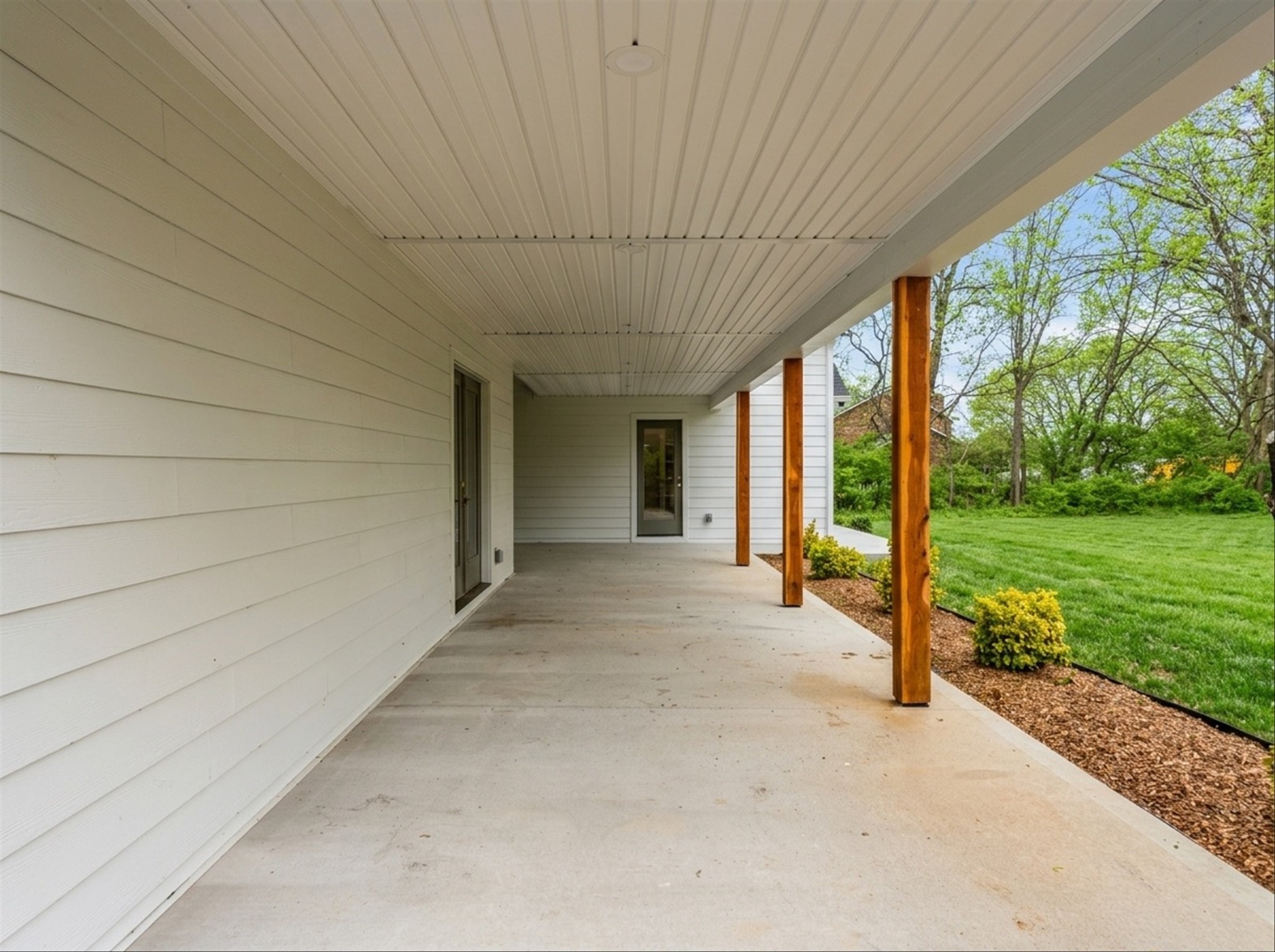 1629 Cairo Road Gallatin, TN 37066 - Photo 47 of 51 a view of a porch with furniture and garden