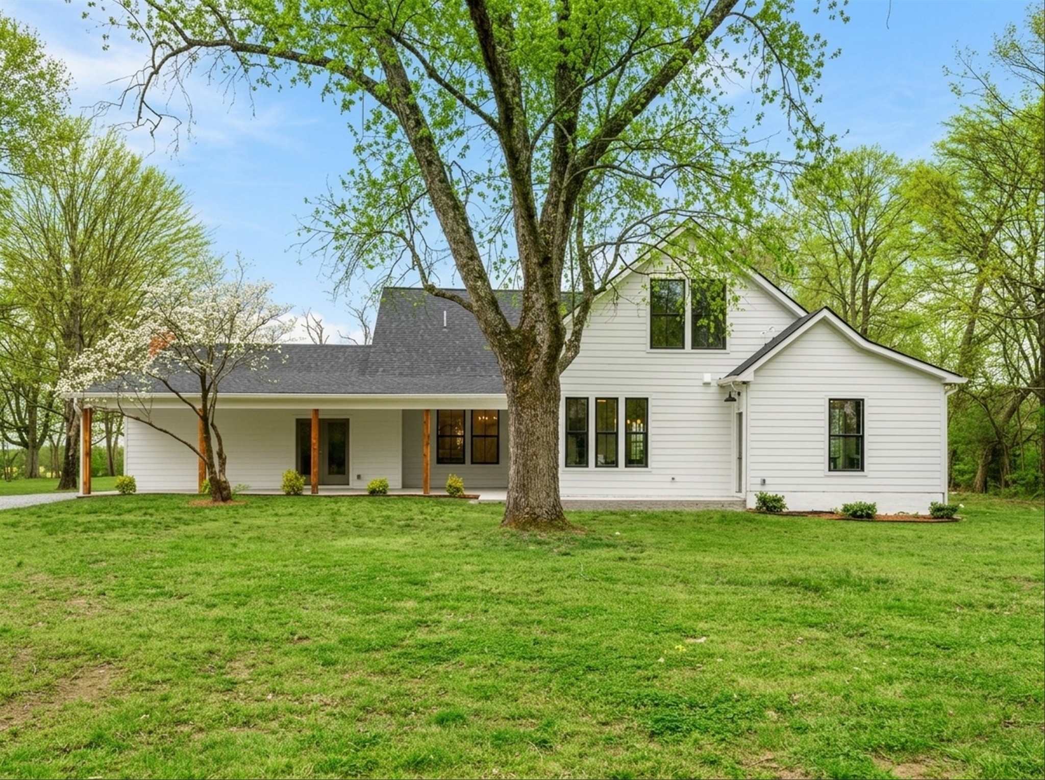 1629 Cairo Road Gallatin, TN 37066 - Photo 50 of 51 a house that has a tree in front of the house
