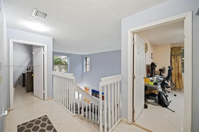 a view of a livingroom with a bedroom