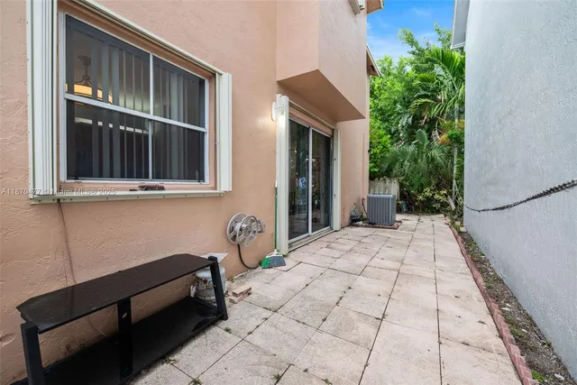 a backyard of a house with seating space
