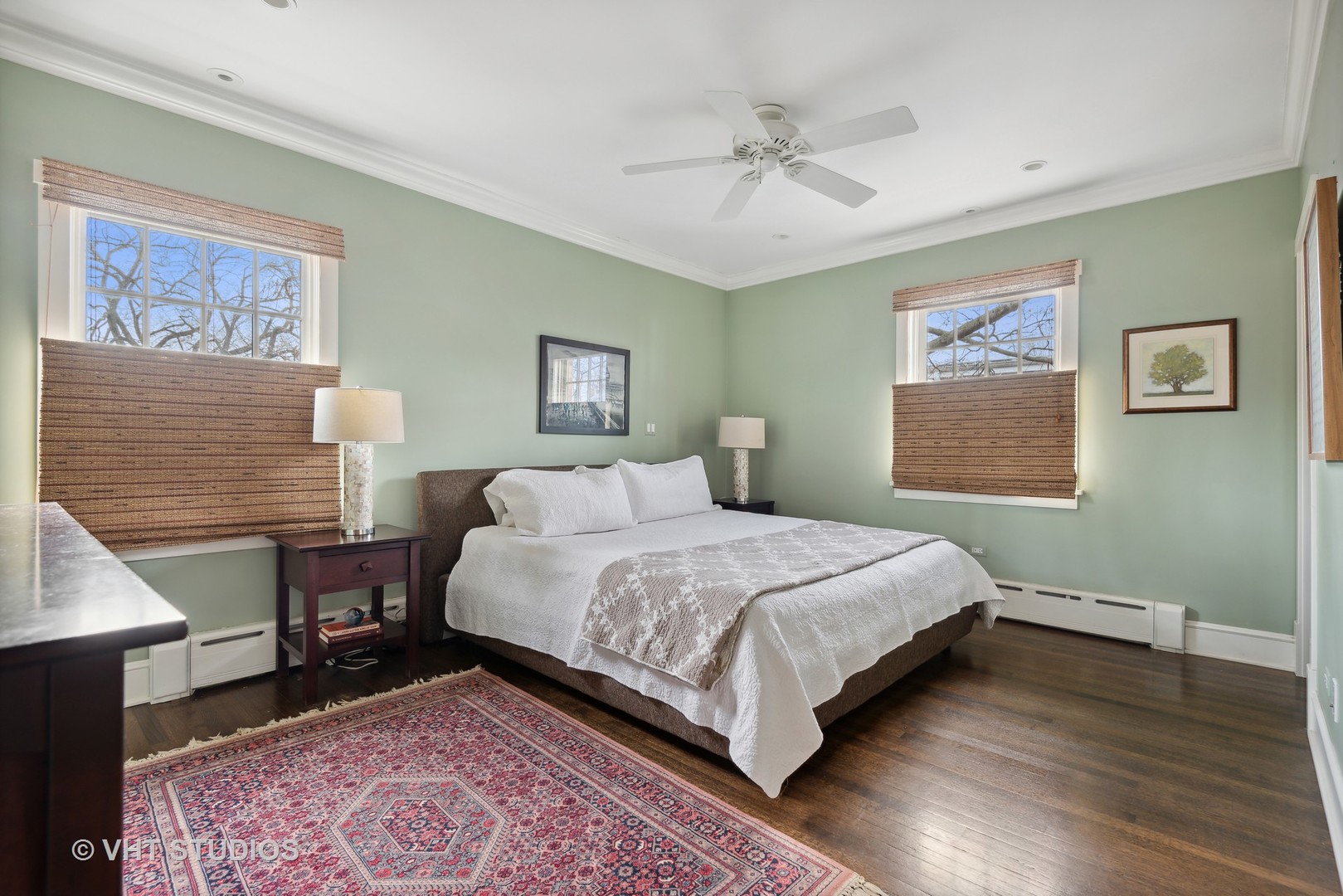 1601 Central Avenue Wilmette, IL 60091 - Photo 16 of 32 a bedroom with a large bed and a chandelier