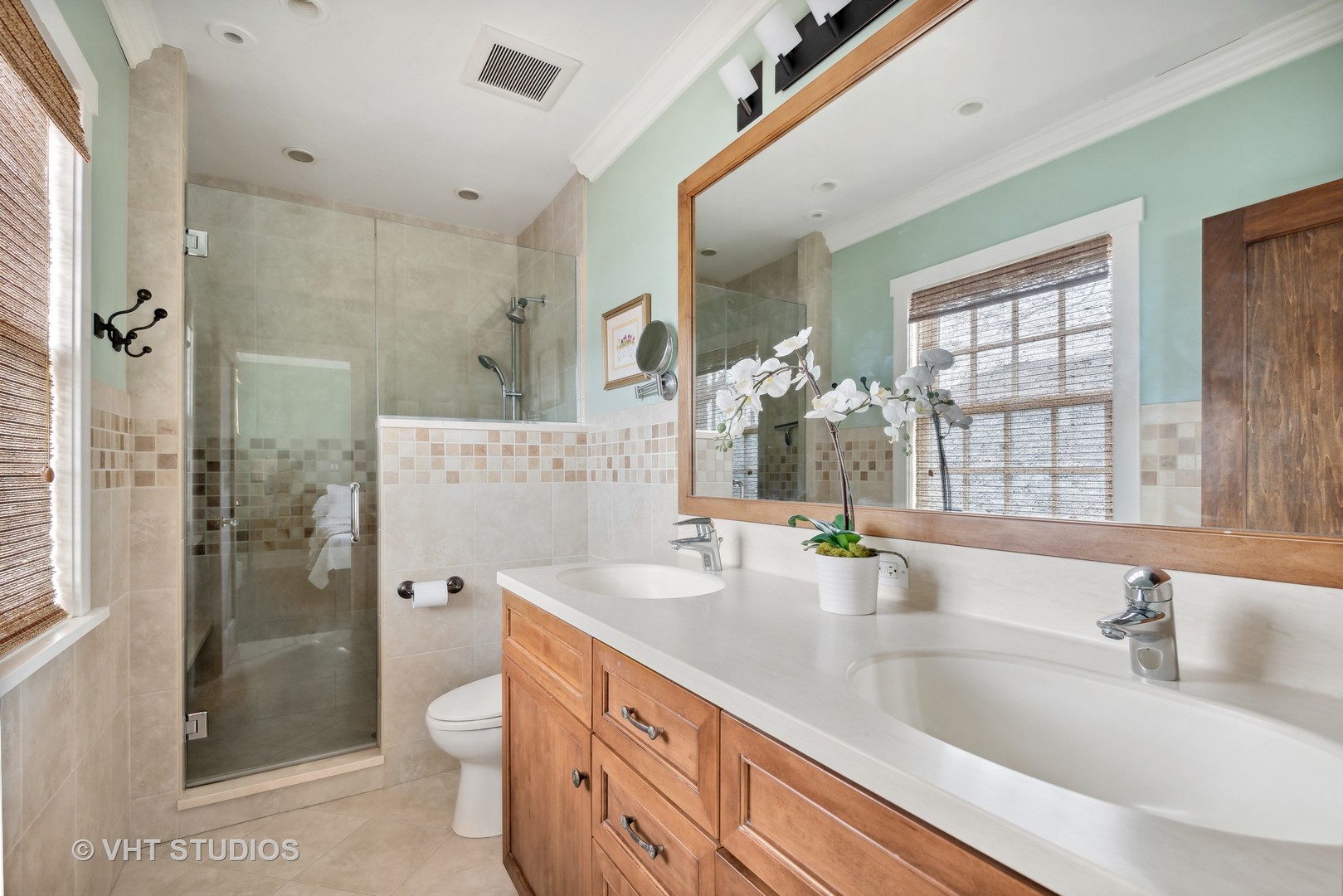 1601 Central Avenue Wilmette, IL 60091 - Photo 17 of 32 a bathroom with a granite countertop sink toilet and shower