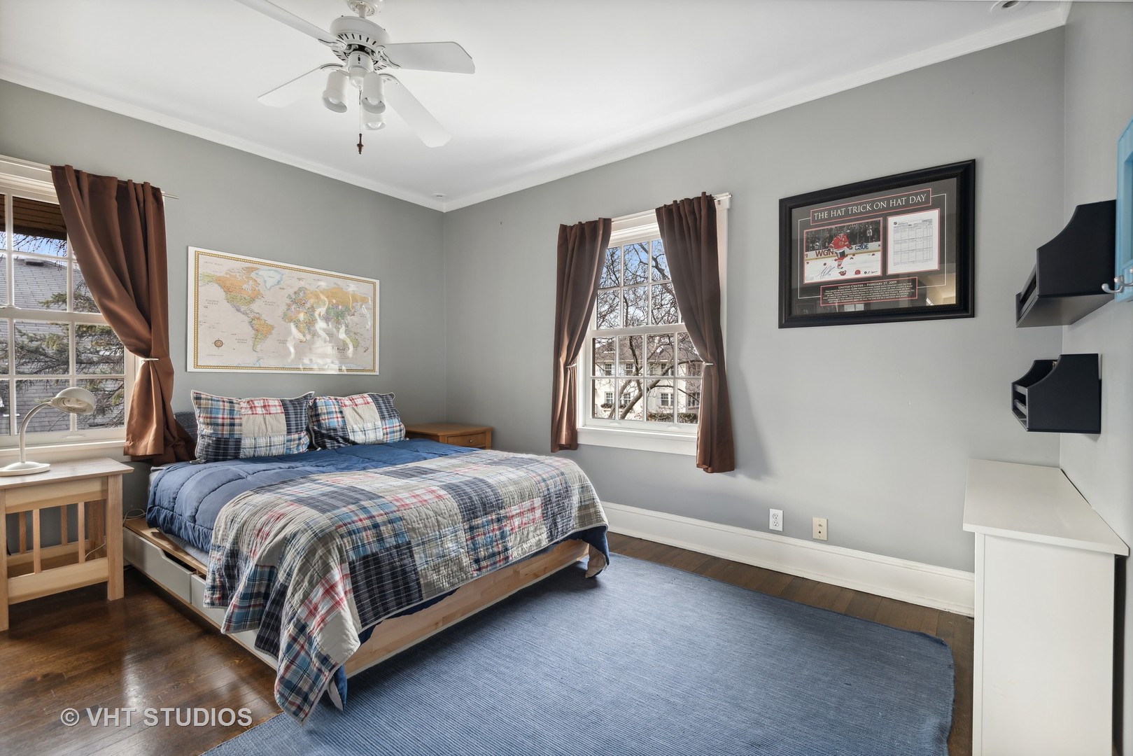 1601 Central Avenue Wilmette, IL 60091 - Photo 19 of 32 a bedroom with a bed painting on wall and a window