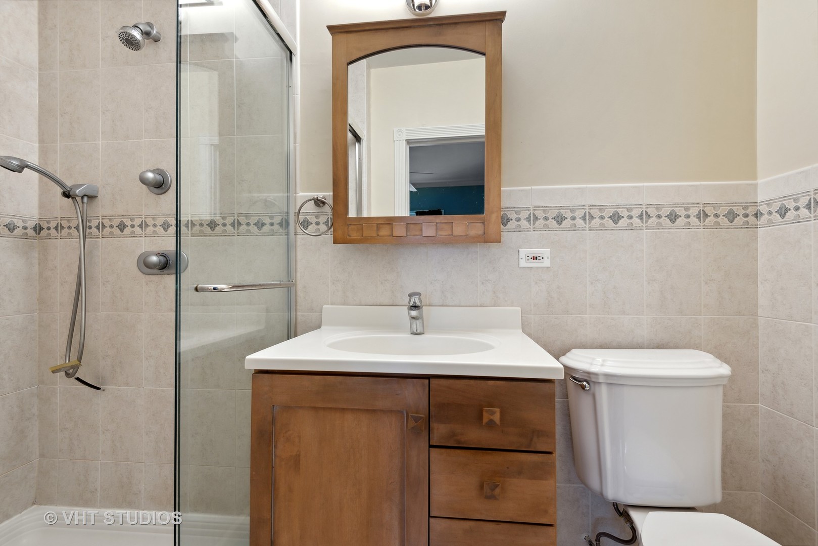 1601 Central Avenue Wilmette, IL 60091 - Photo 22 of 32 a bathroom with a sink toilet and mirror