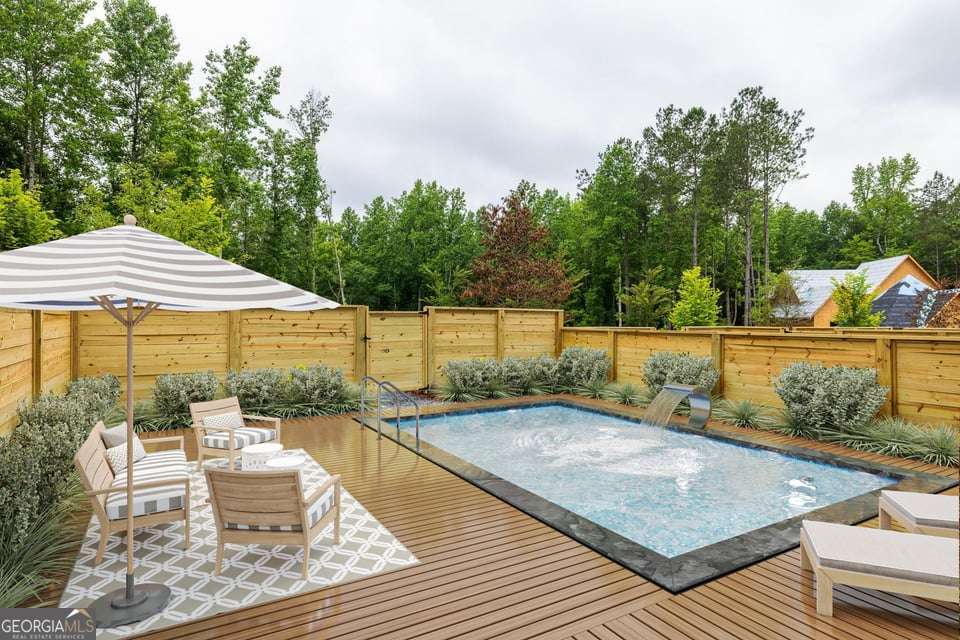 11554 Serenbe Lane Chattahoochee Hills, GA 30268 - Photo 13 of 16 swimming pool view with a seating space