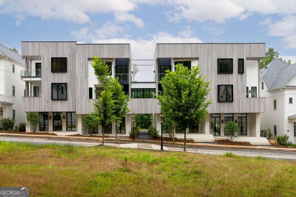 11554 Serenbe Lane Chattahoochee Hills, GA 30268 - Photo 16 of 16 a view of house with swimming pool and furniture