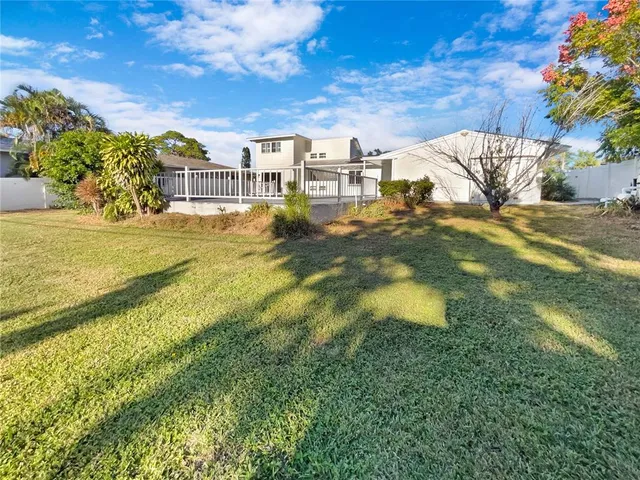 a view of a lake with a building in the background