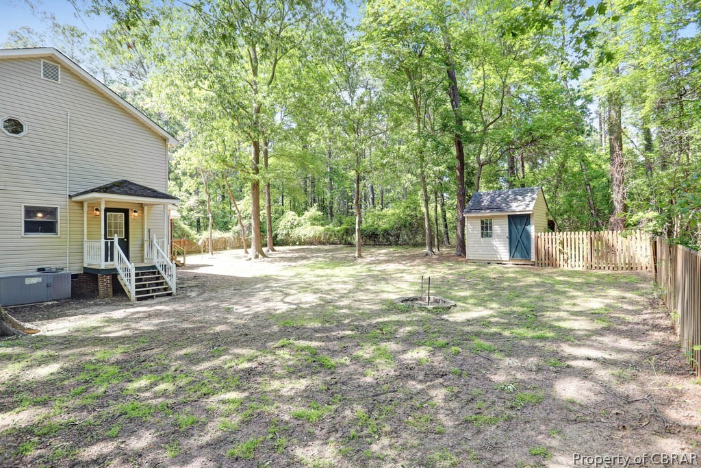 7025 Mumford Cove Road Hayes, VA 23072 - Photo 38 of 43 Entry way into kitchen from side yard