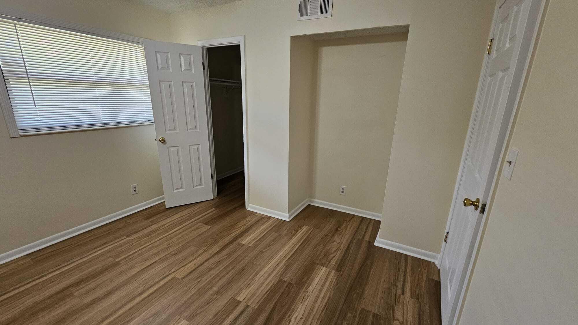 8801 West Sample Road, Unit 11 Coral Springs, FL 33065 - Photo 11 of 25 2ND BEDROOM_8801 SAMPLE RD