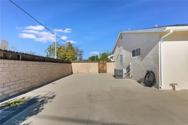a view of a back yard of the house