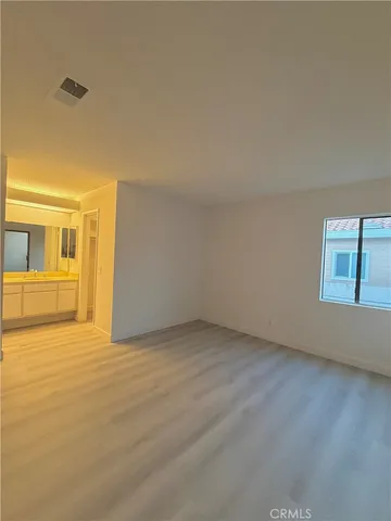 a view of an empty room with window