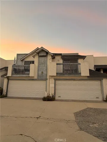 a view of a house with a gate