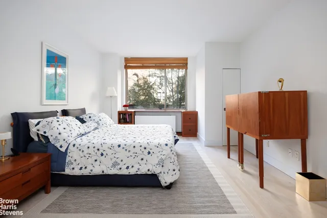 a kitchen with a sink a stove and cabinets