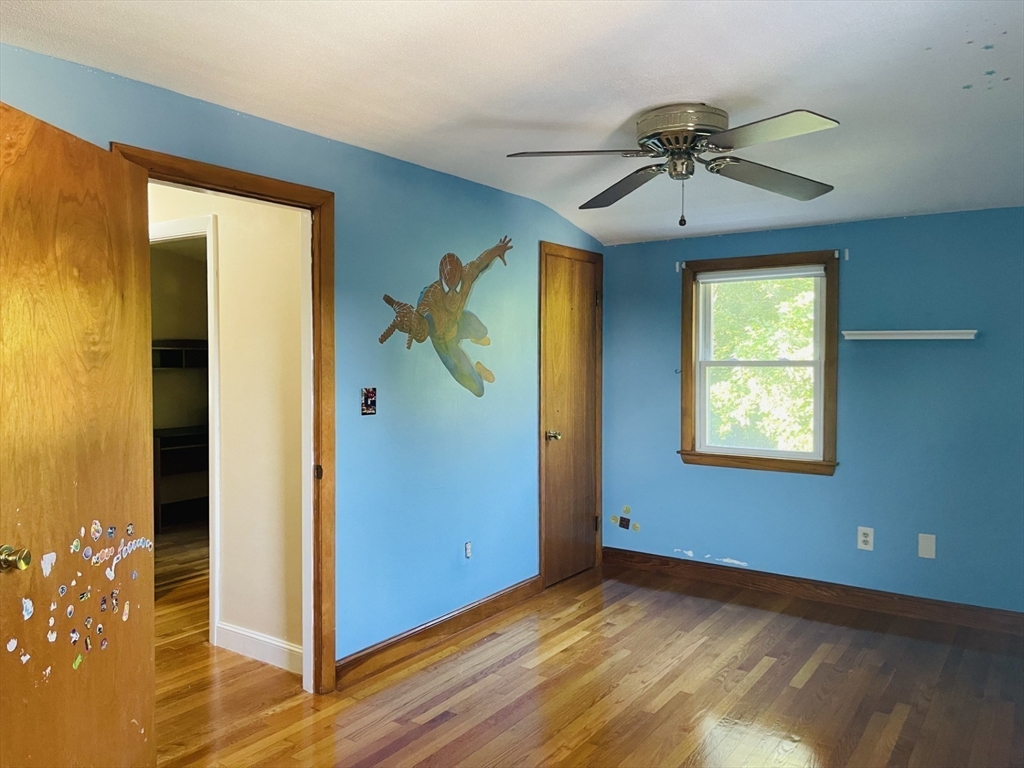 52 Westview Road Lynn, MA 01902 - Photo 21 of 32 a view of empty room with wooden floor and fan