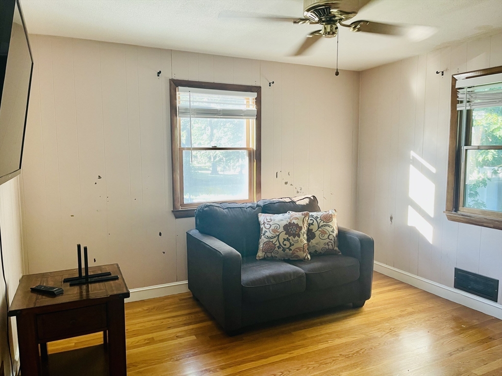 52 Westview Road Lynn, MA 01902 - Photo 22 of 32 a living room with furniture and a window