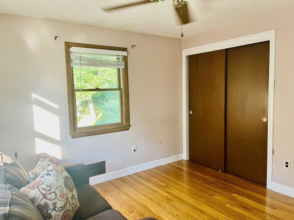 52 Westview Road Lynn, MA 01902 - Photo 24 of 32 a bedroom with a bed and a window
