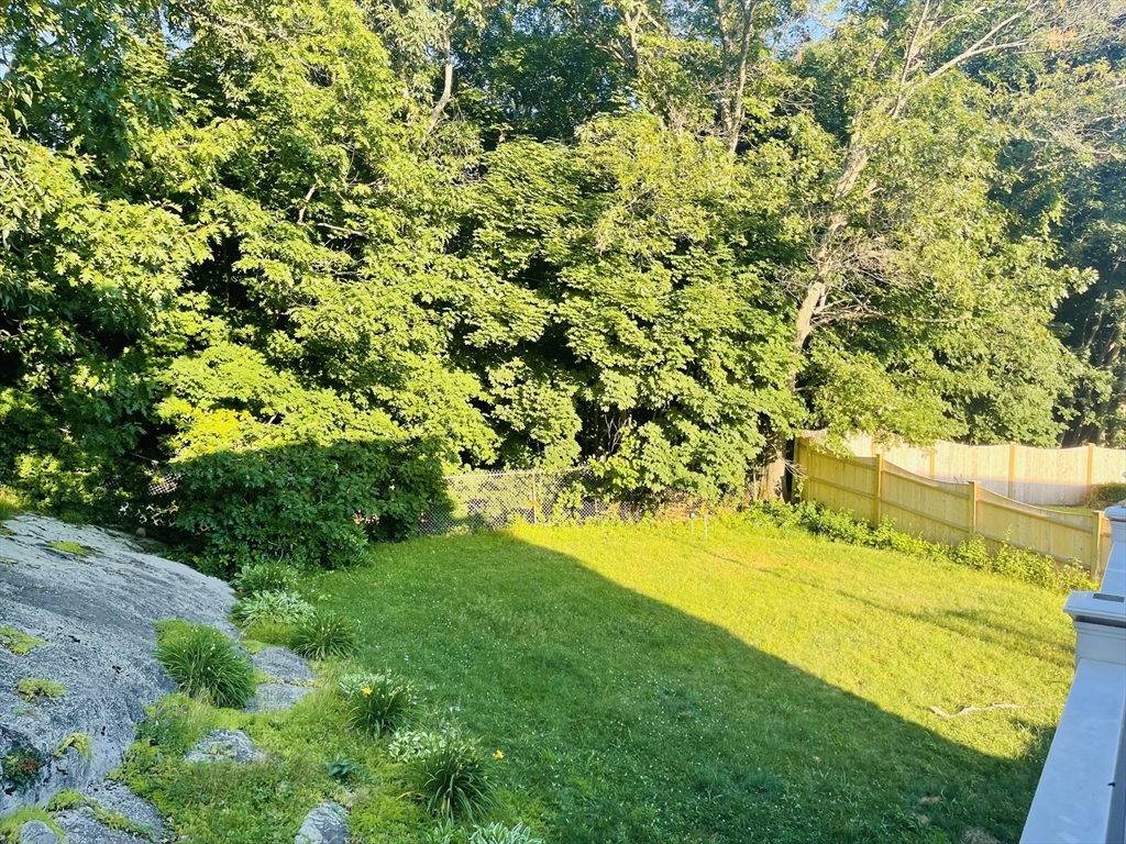 52 Westview Road Lynn, MA 01902 - Photo 29 of 32 a view of a yard with an outdoor space