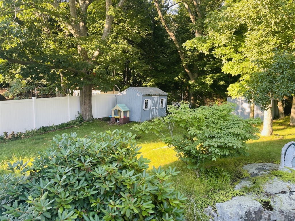 52 Westview Road Lynn, MA 01902 - Photo 30 of 32 an aerial view of a house with swimming pool and garden