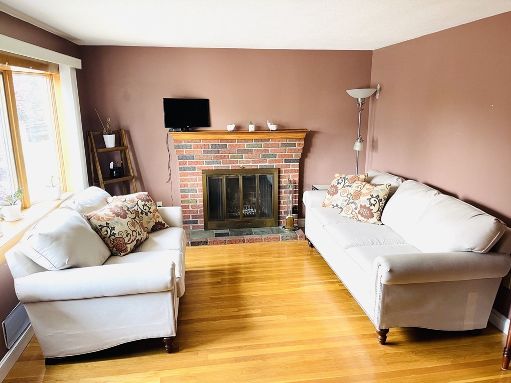 52 Westview Road Lynn, MA 01902 - Photo 3 of 32 a living room with furniture and a fireplace