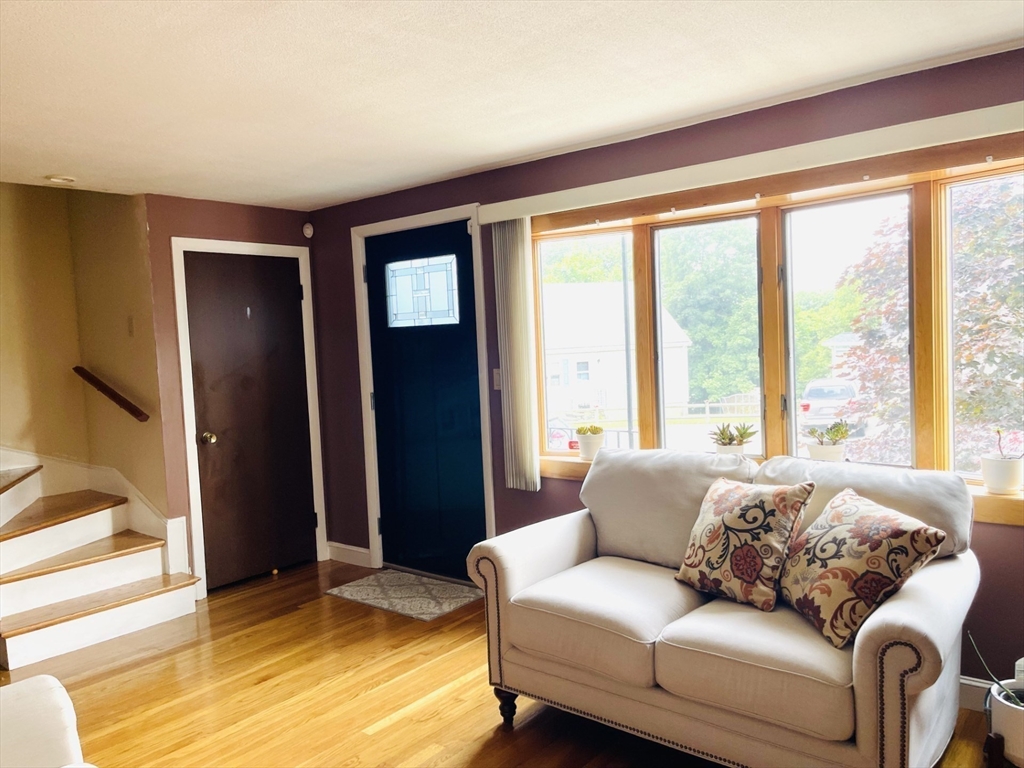 52 Westview Road Lynn, MA 01902 - Photo 4 of 32 a living room with furniture and a large window