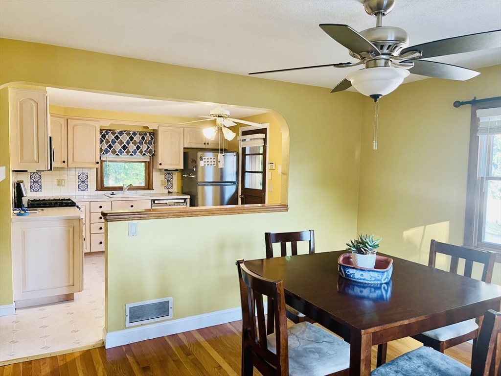 52 Westview Road Lynn, MA 01902 - Photo 9 of 32 a view of a dining room with furniture and a chandelier