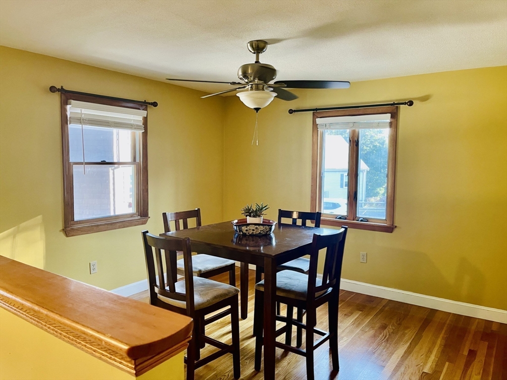 52 Westview Road Lynn, MA 01902 - Photo 10 of 32 a view of a dining room with furniture and a chandelier