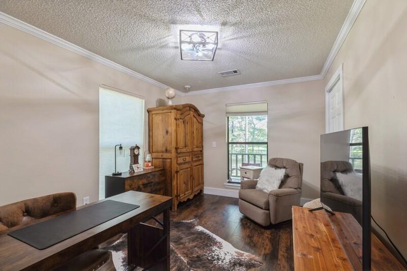5540 Old River Road Baker, FL 32531 - Photo 20 of 37 a living room with furniture and wooden floor