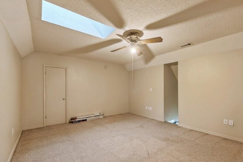 5540 Old River Road Baker, FL 32531 - Photo 22 of 37 an empty room with a ceiling fan and a fan