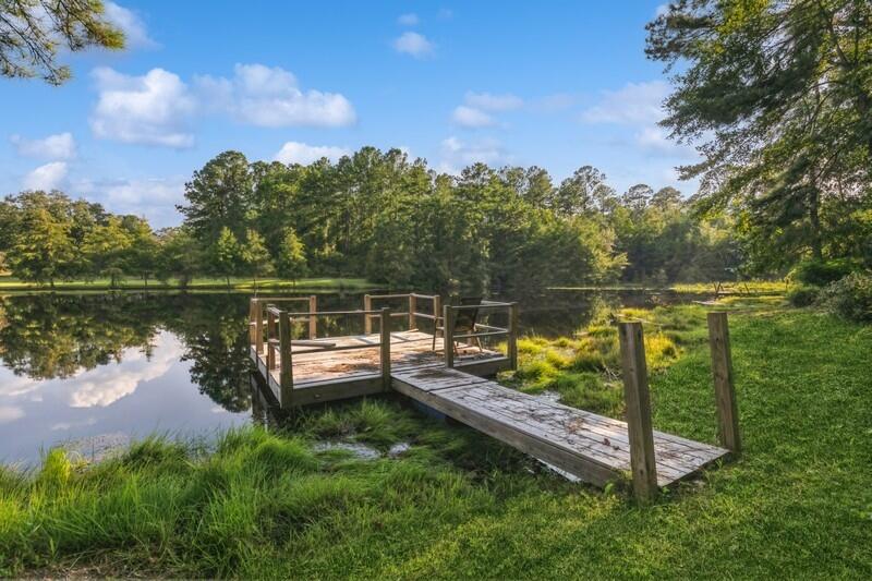 5540 Old River Road Baker, FL 32531 - Photo 31 of 37 a view of a lake with houses in the back