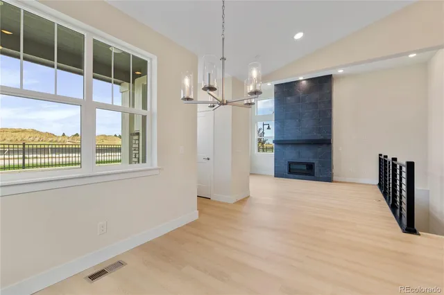 a kitchen with stainless steel appliances granite countertop a stove sink and cabinets
