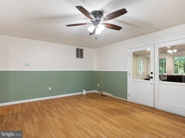 a view of a livingroom with a fan