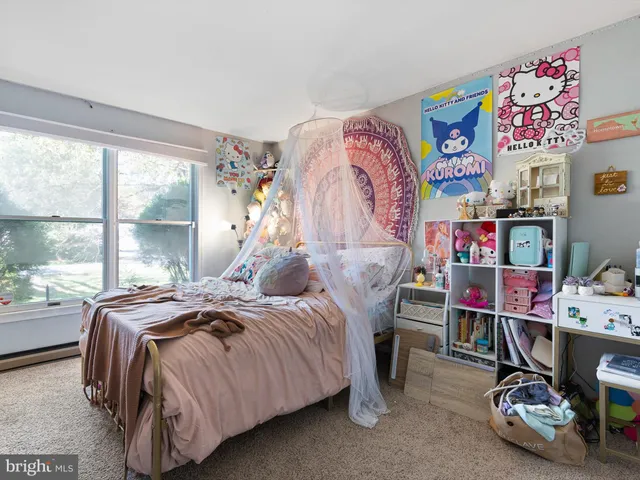 a bed room with a bed and a bed