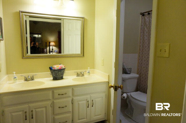 21 Soldiers Route Spanish Fort, AL 36527 - Photo 13 of 19 Master bath has double sinks, separate shower/toilet area