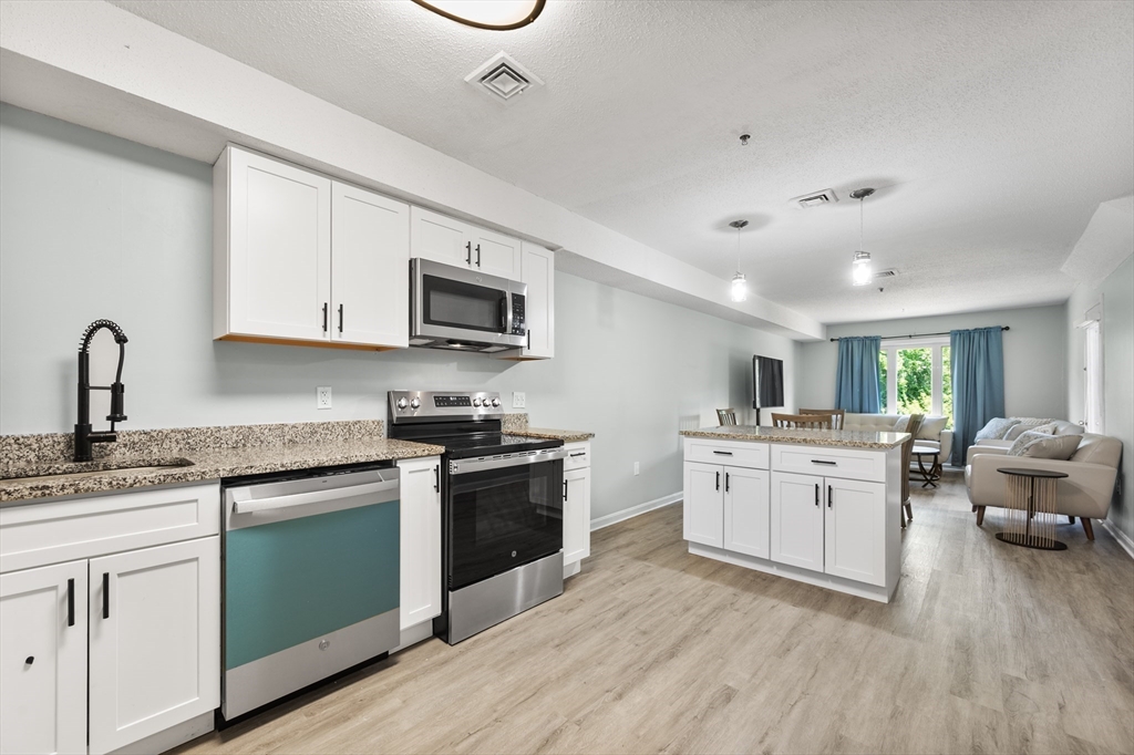 4 Duck Pond Road, Unit 211 Beverly, MA 01915 - Photo 2 of 26 Gallery Image 2