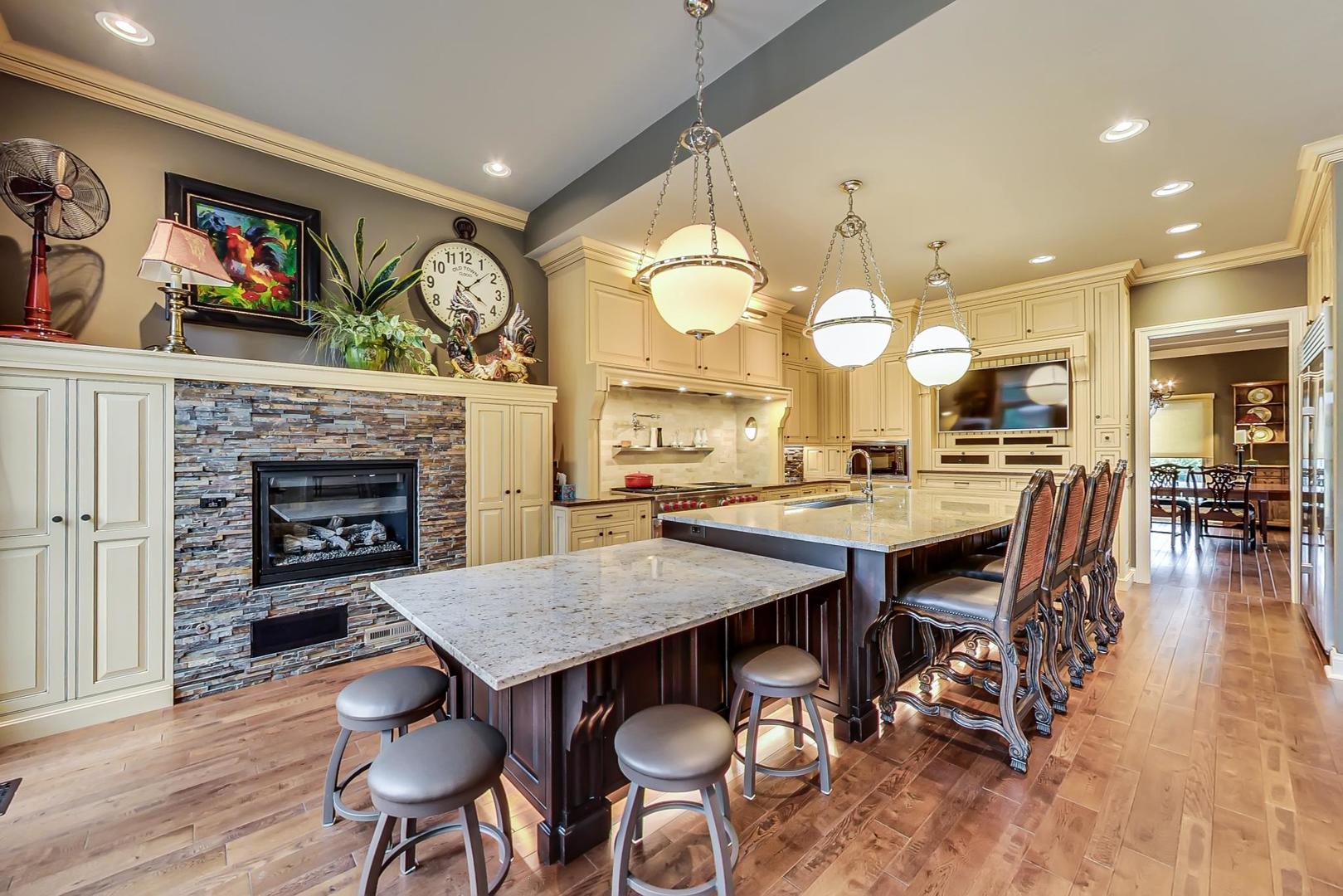 5N198 Dover Hill Road St. Charles, IL 60175 - Photo 11 of 65 a view of a dining room with furniture and wooden floor