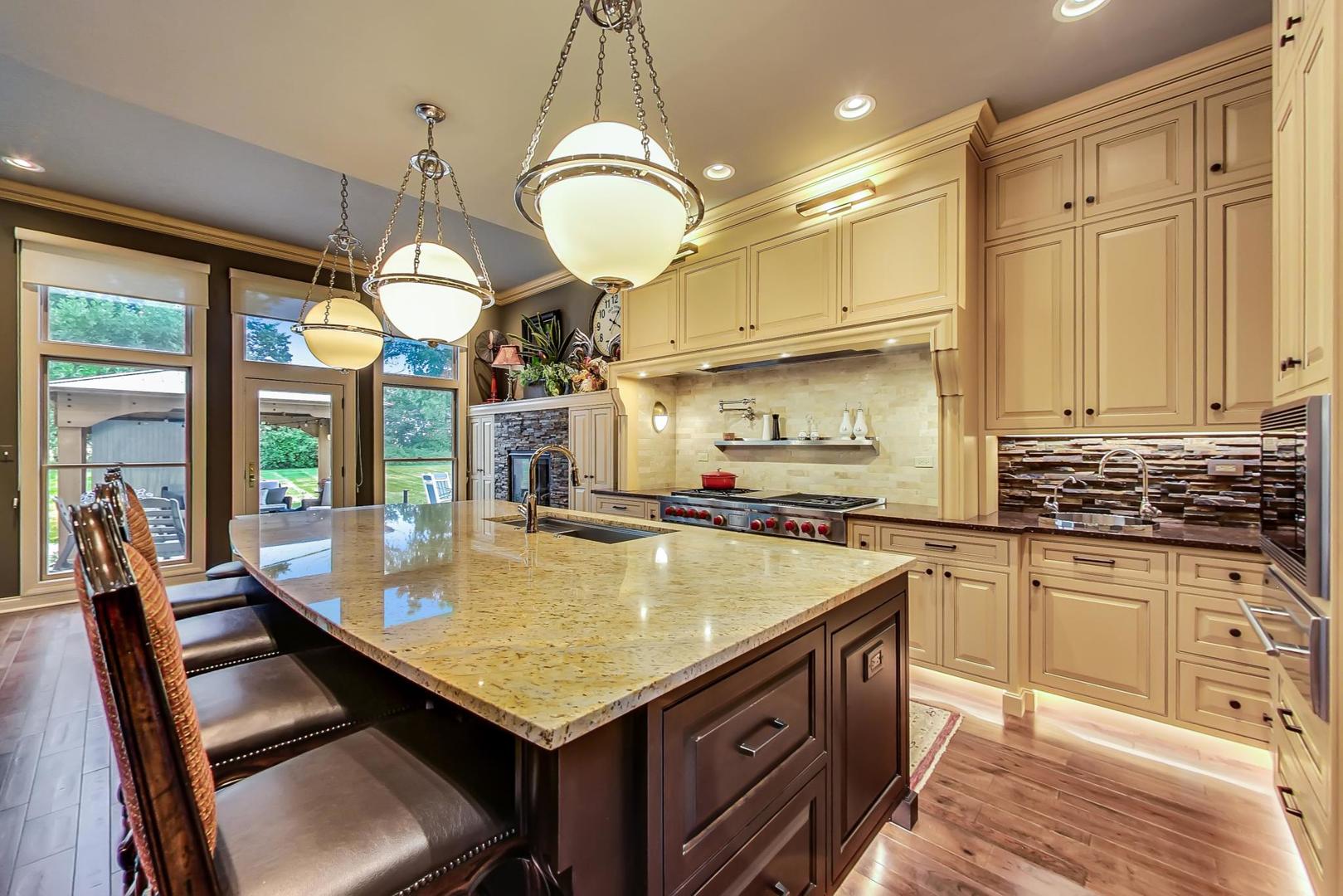 5N198 Dover Hill Road St. Charles, IL 60175 - Photo 14 of 65 a large kitchen with kitchen island a large island in it