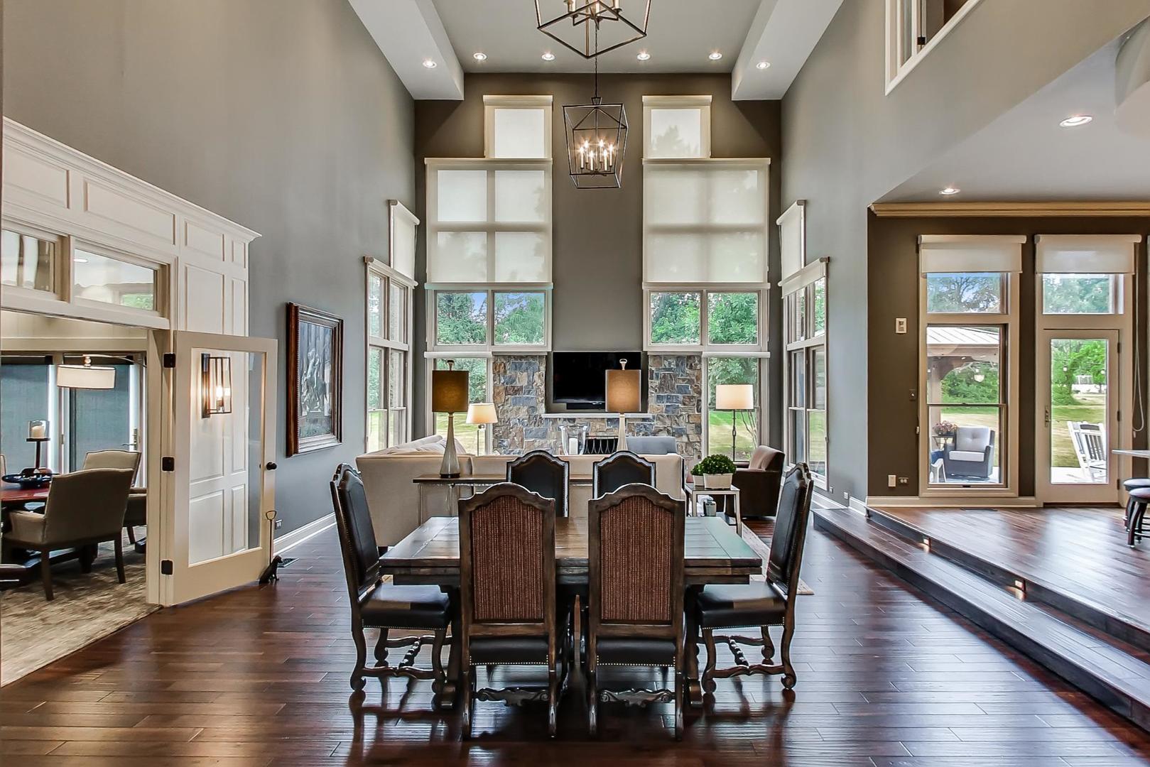 5N198 Dover Hill Road St. Charles, IL 60175 - Photo 16 of 65 a view of a dining room with furniture window and wooden floor