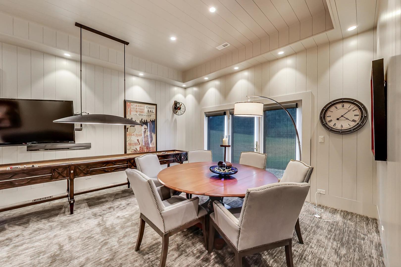 5N198 Dover Hill Road St. Charles, IL 60175 - Photo 26 of 65 a kitchen with a dining table and chairs