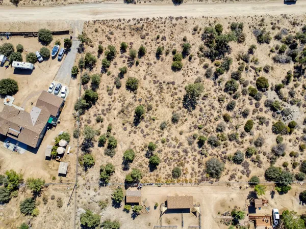 an aerial view of a house with a garden