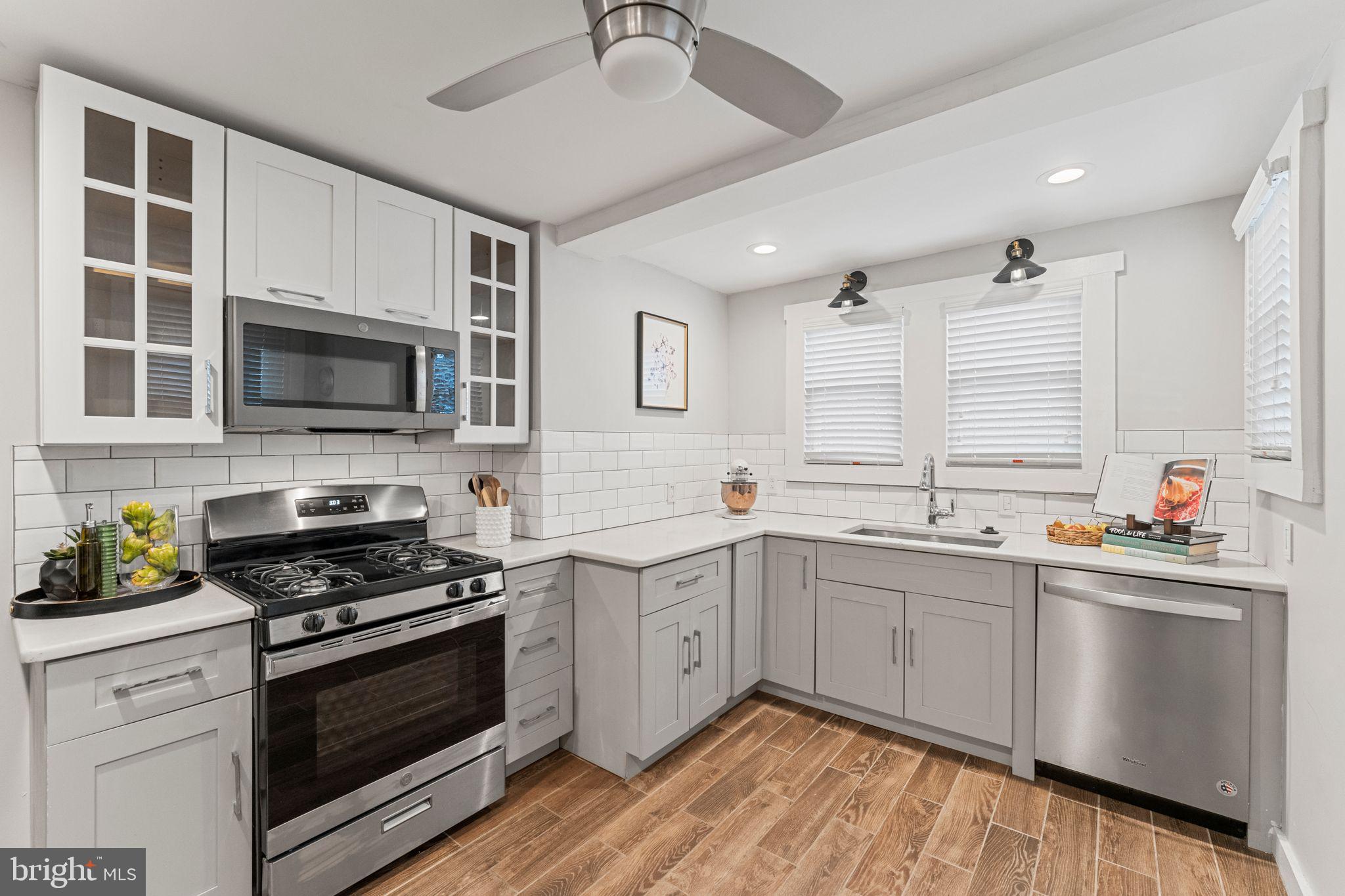 471 Pleasant Street Philadelphia, PA 19119 - Photo 10 of 22 Modern kitchen with sleek finishes.