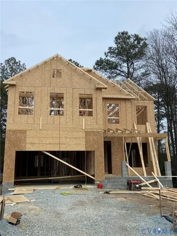 a front view of a house with garage