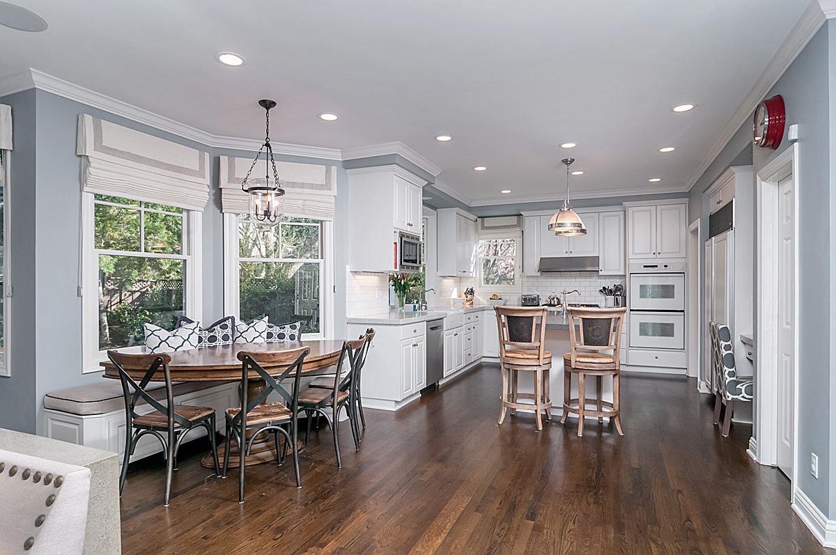 2 Brady Place Menlo Park, CA 94025 - Photo 17 of 33 a kitchen with a table chairs wooden floor and stainless steel appliances