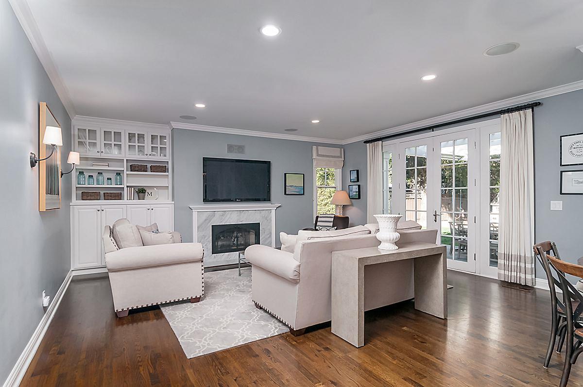 2 Brady Place Menlo Park, CA 94025 - Photo 20 of 33 a living room with fireplace furniture and a flat screen tv