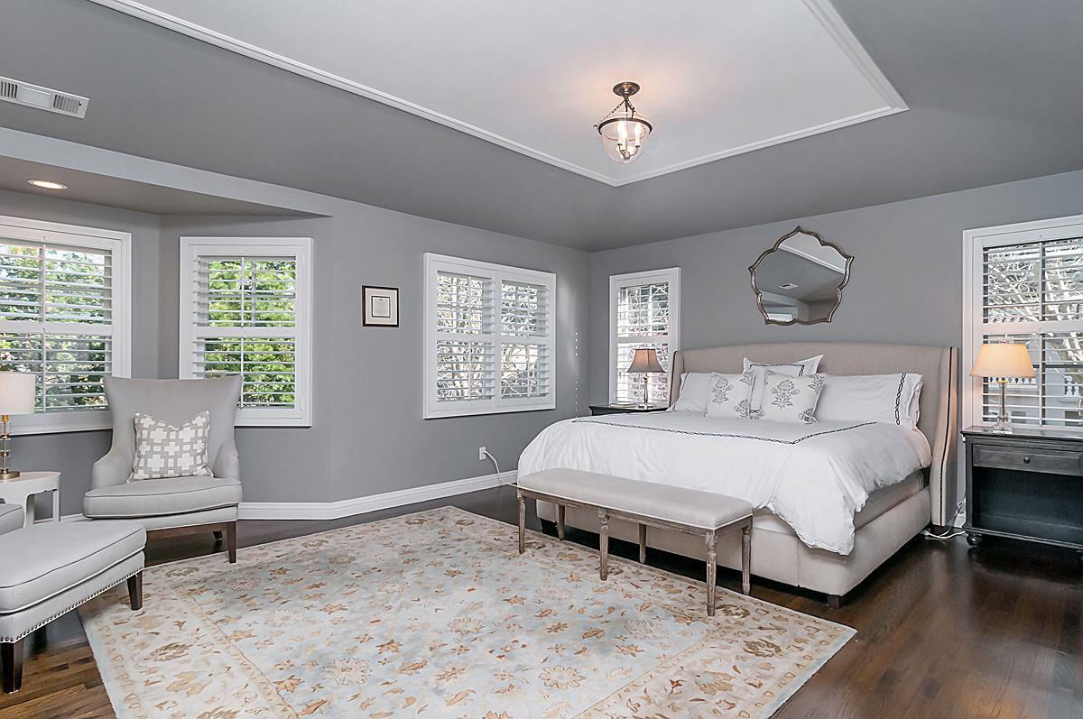 2 Brady Place Menlo Park, CA 94025 - Photo 23 of 33 a spacious bedroom with a bed and wooden floor