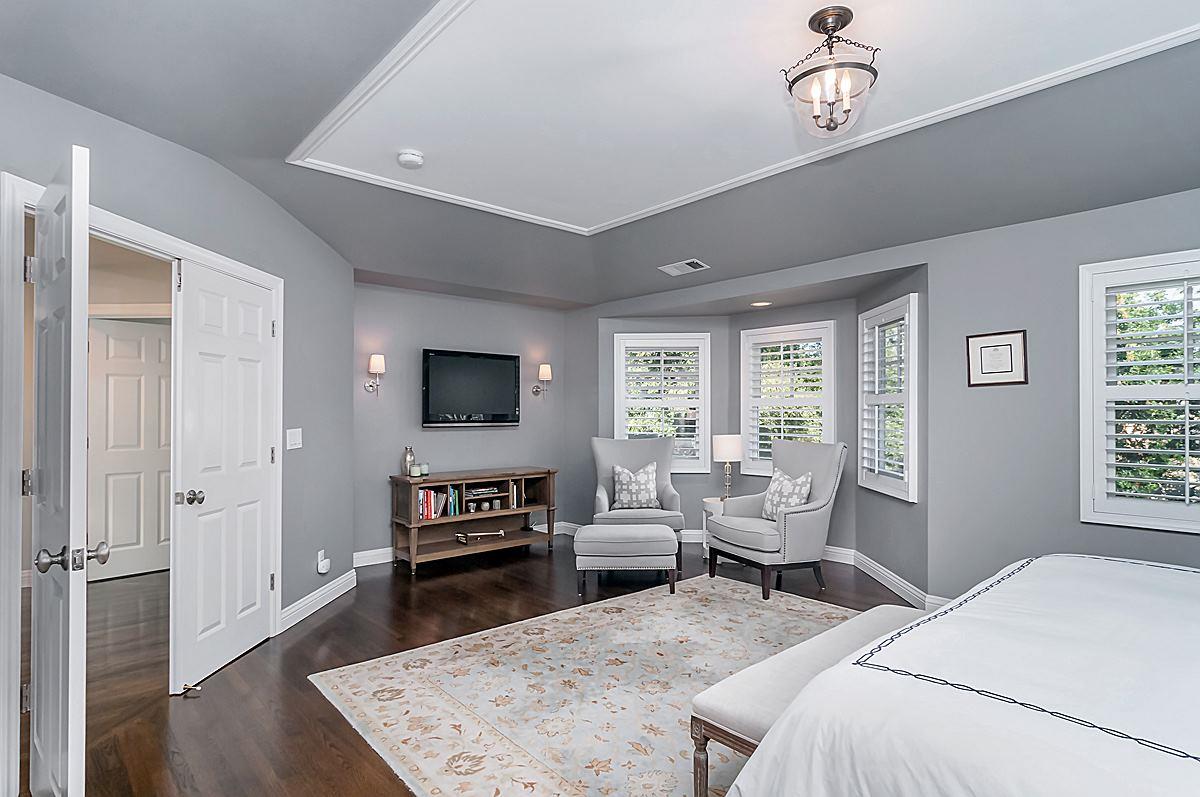 2 Brady Place Menlo Park, CA 94025 - Photo 24 of 33 a bedroom with a bed and wooden floor