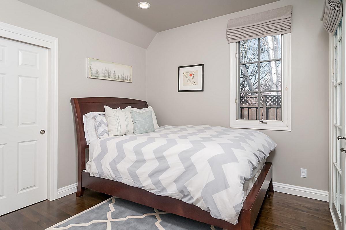 2 Brady Place Menlo Park, CA 94025 - Photo 29 of 33 a bedroom with a bed and wooden floor